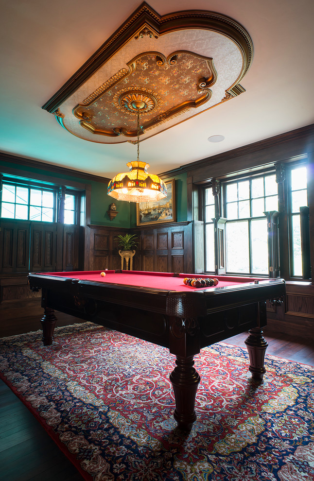 Photo of a medium sized traditional enclosed games room in Boston with a game room, green walls, dark hardwood flooring, no fireplace and brown floors.