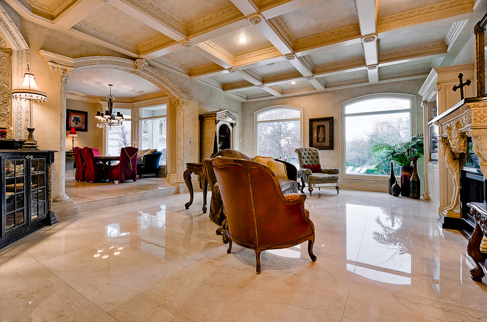 Foto de sala de estar clásica con suelo de mármol, todas las chimeneas y marco de chimenea de yeso