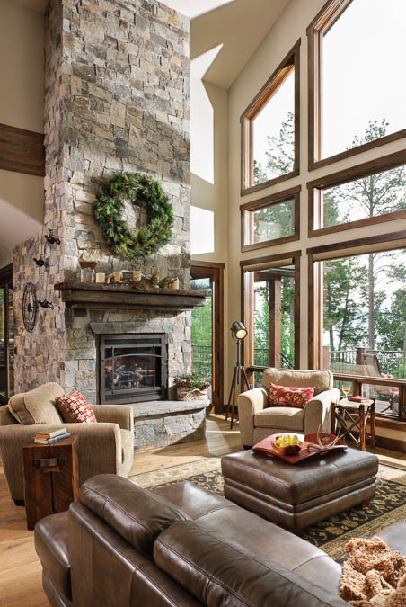 Family room - craftsman family room idea in Other with a standard fireplace and a stone fireplace
