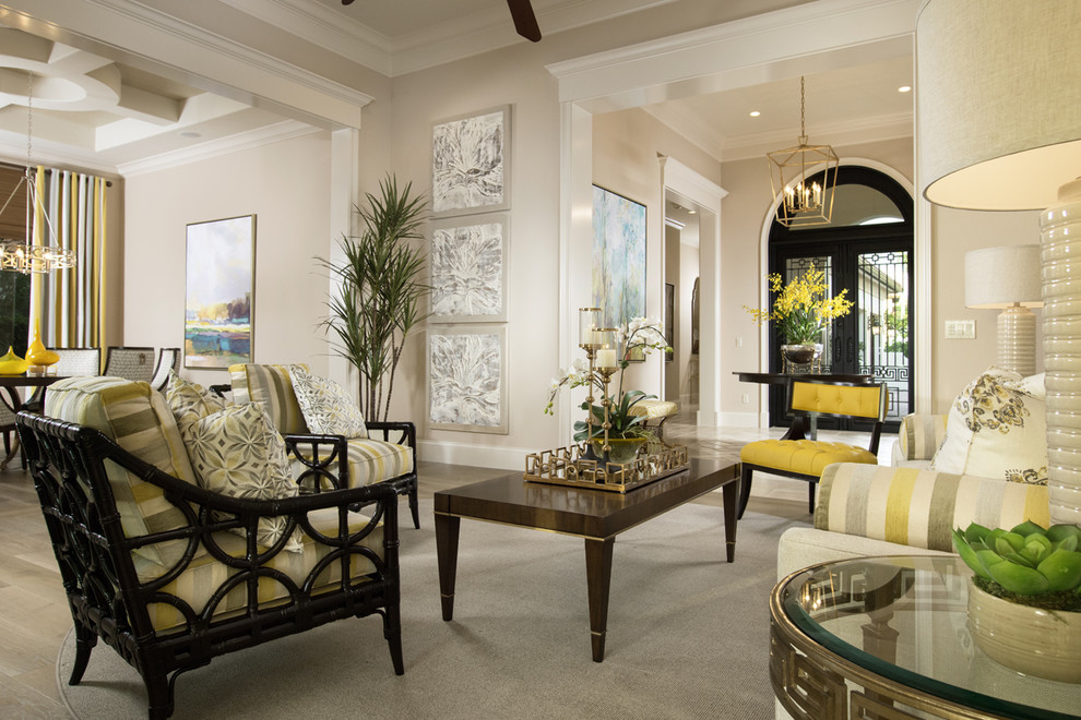 Example of an island style family room design in Miami