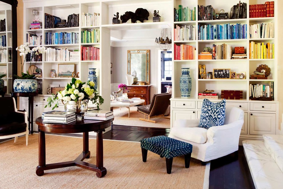 Example of a classic family room library design in San Diego