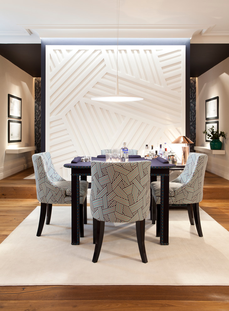 Large trendy medium tone wood floor dining room photo in Madrid with white walls and no fireplace