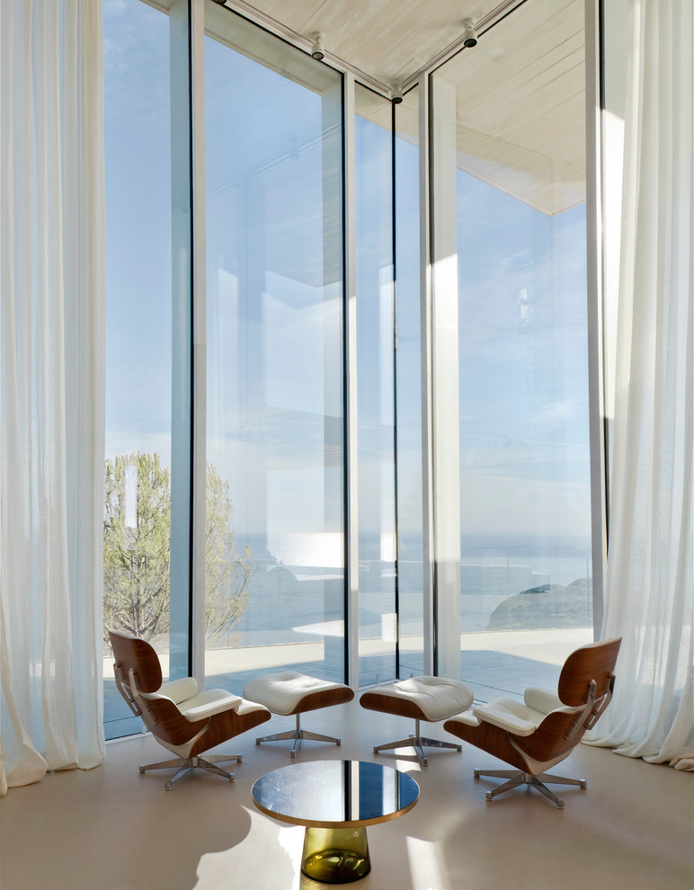 Großes, Fernseherloses, Offenes Modernes Wohnzimmer ohne Kamin mit Betonboden in Alicante-Costa Blanca