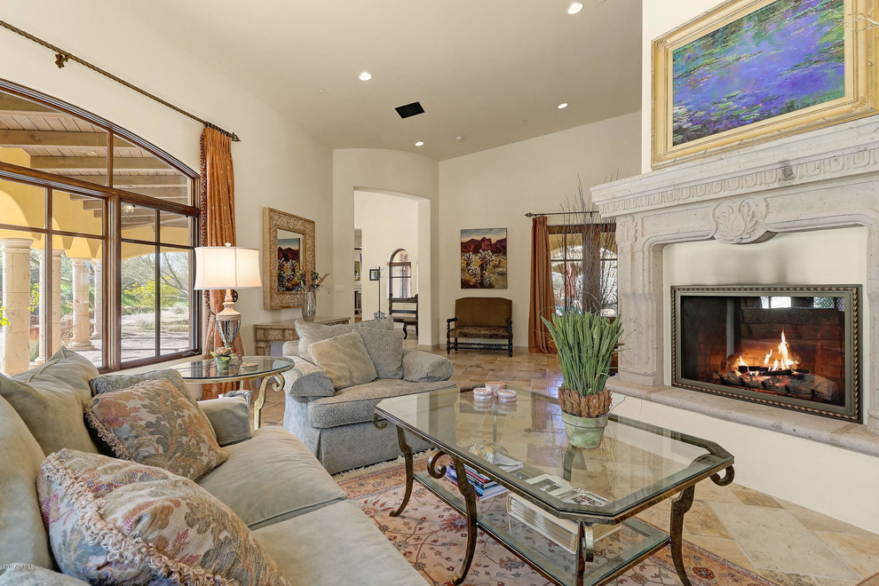 Inspiration for an expansive mediterranean open plan games room in Phoenix with white walls, medium hardwood flooring, a two-sided fireplace and multi-coloured floors.