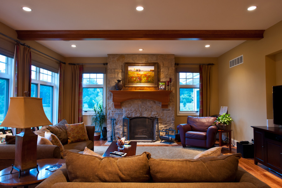 Example of a classic family room design in Milwaukee
