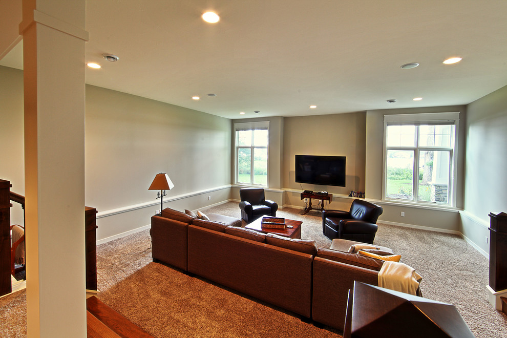 Design ideas for a classic games room in Grand Rapids with beige walls, carpet and a wall mounted tv.