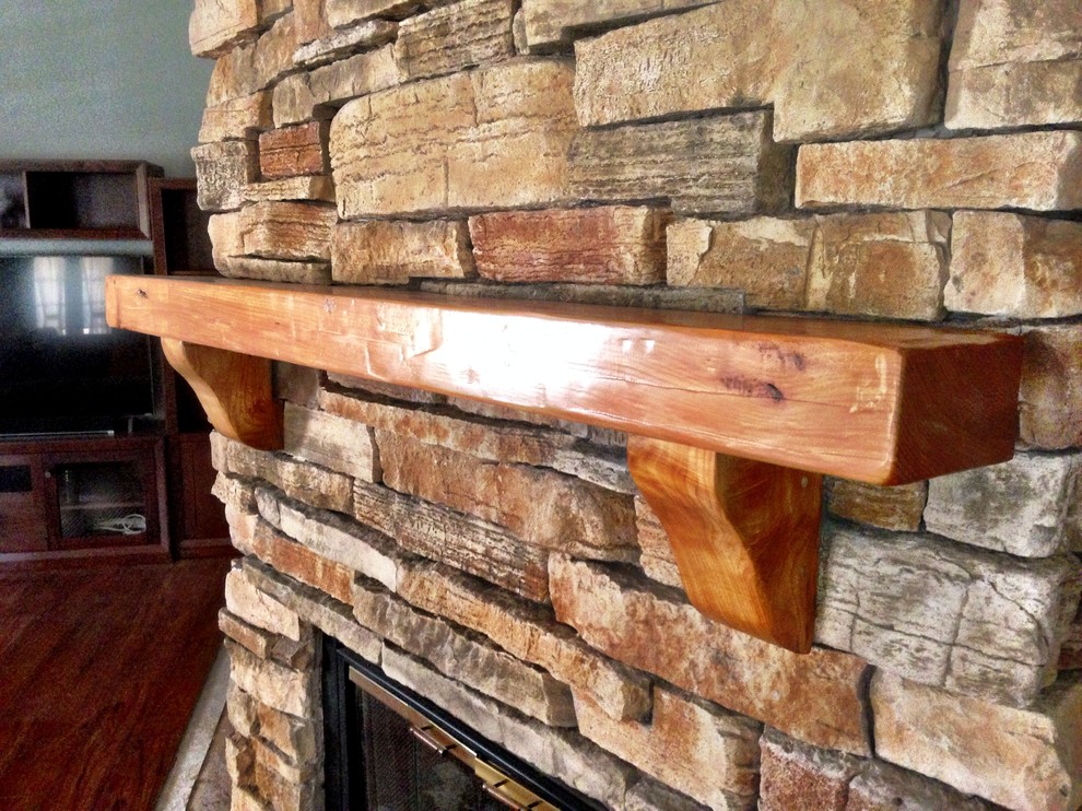 Inspiration for a medium sized rustic games room in Sacramento with dark hardwood flooring, a two-sided fireplace and a stone fireplace surround.