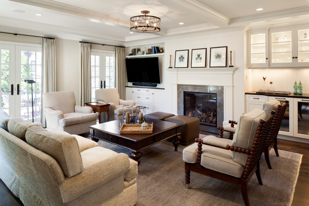 Inspiration for a classic games room in Milwaukee with white walls, dark hardwood flooring, a standard fireplace, a stone fireplace surround and a wall mounted tv.