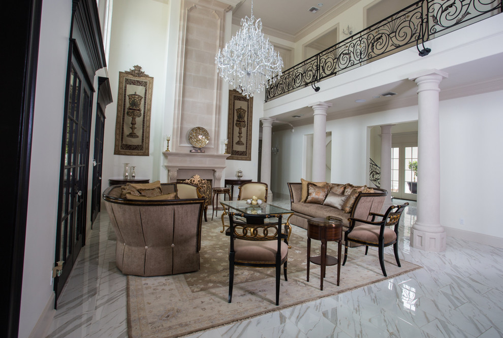 Example of a huge ornate open concept ceramic tile family room design in New Orleans with white walls, a standard fireplace, a tile fireplace and no tv