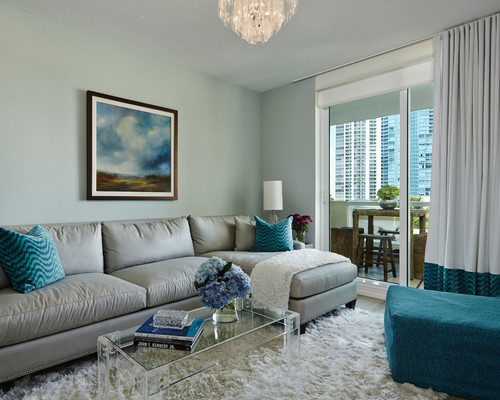 LIVING ROOM WITH Benjamin Moore Quiet Moments Paint Color: pale blue paint color inspiration for a tranquil and serene room.
