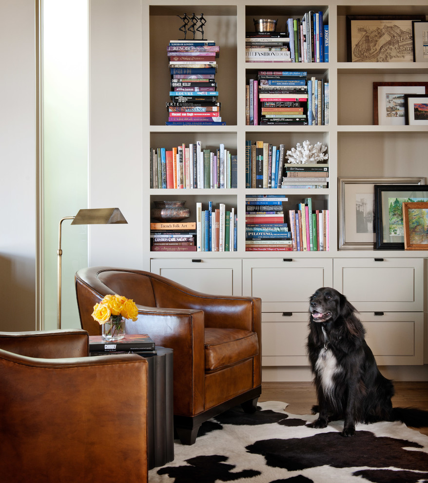 Example of a trendy family room library design in Seattle