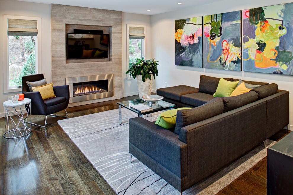 Inspiration for a contemporary family room remodel in New York with white walls, a ribbon fireplace and a wall-mounted tv