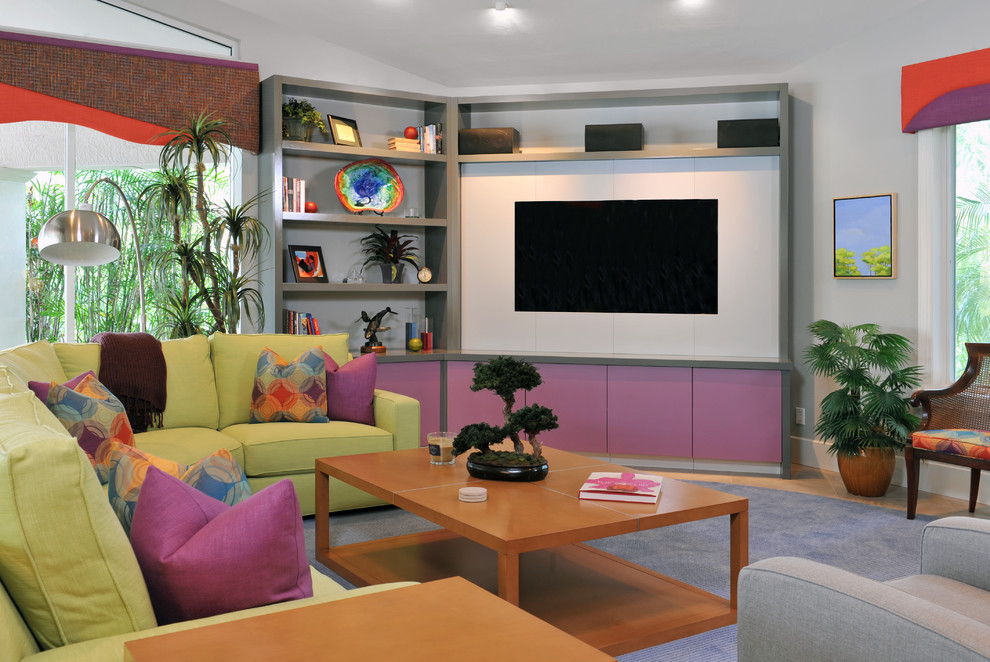 Photo of a contemporary open plan games room in Miami with grey walls, a built-in media unit, porcelain flooring and beige floors.