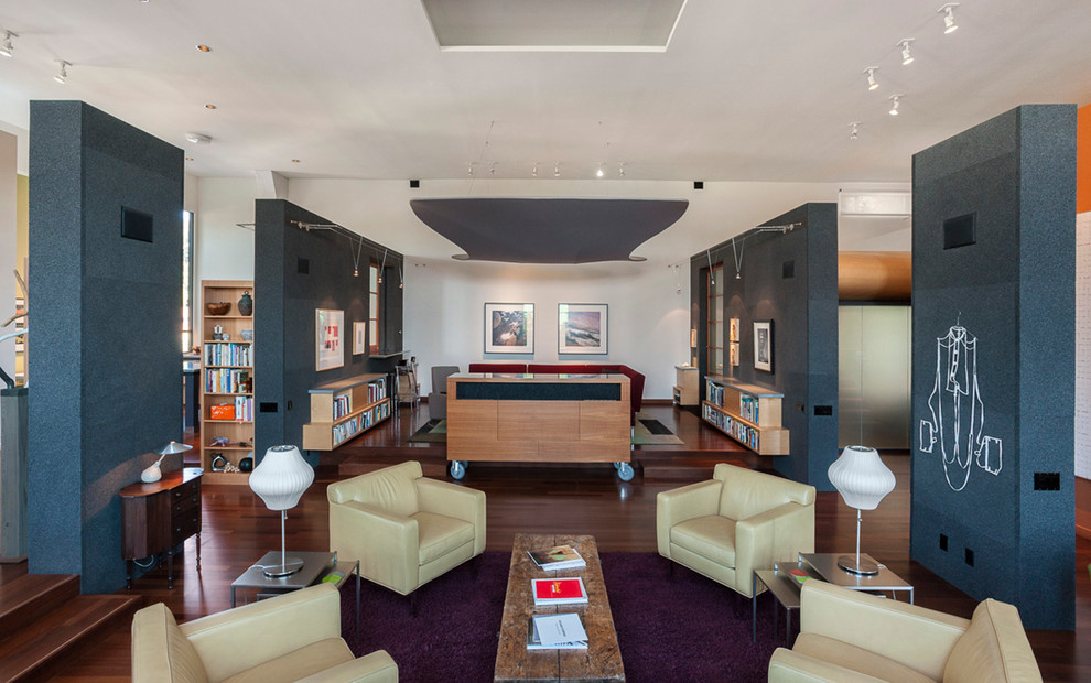 Inspiration for a contemporary open concept dark wood floor family room remodel in San Francisco with black walls