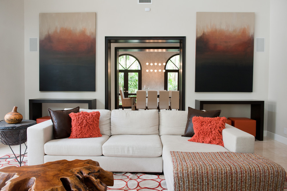 Trendy family room photo in Miami with beige walls