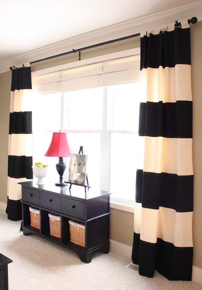 Family room - traditional carpeted family room idea in Detroit with beige walls