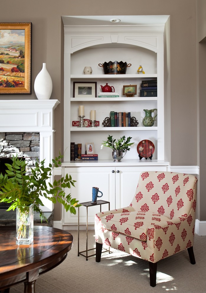 Family room - large traditional open concept carpeted family room idea in Atlanta with beige walls, a standard fireplace, a stone fireplace and a concealed tv