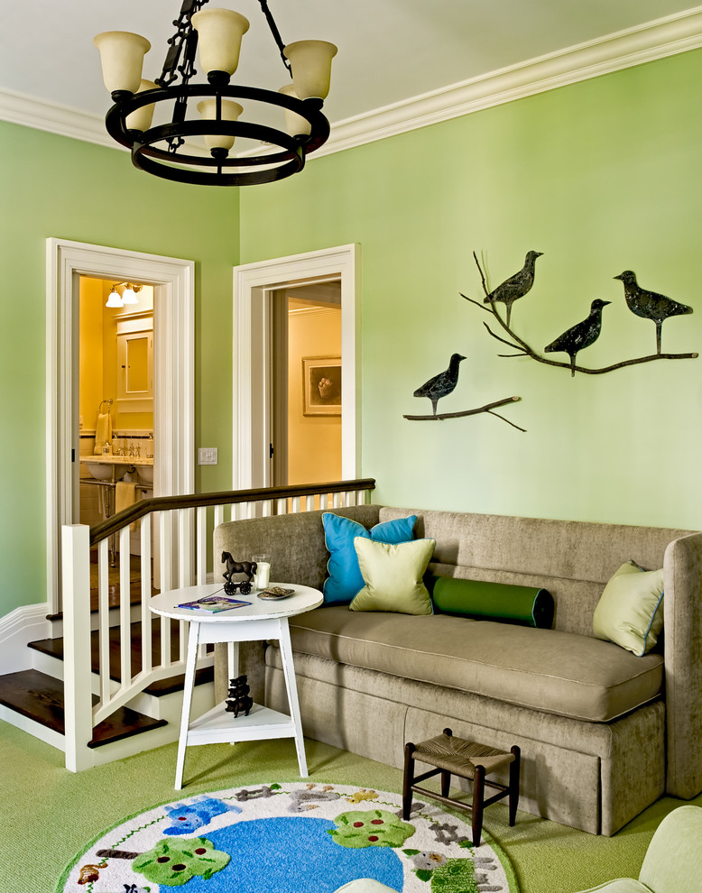 Example of a classic family room design in New York with green walls