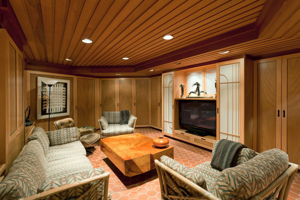 Inspiration for an enclosed family room remodel in San Francisco with a media wall