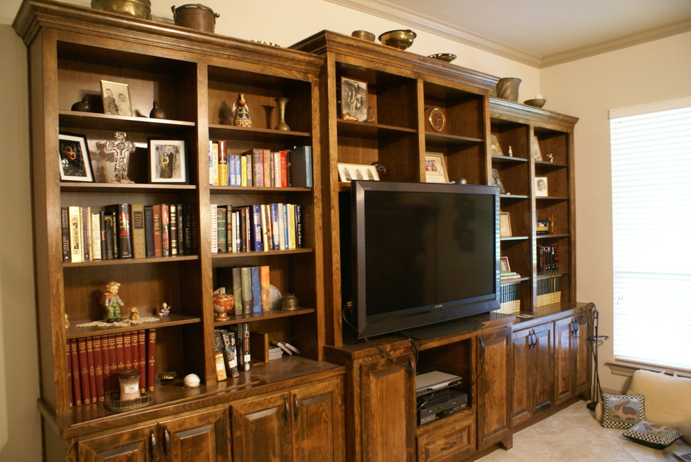 Inspiration for a medium sized traditional games room in Houston with travertine flooring and a freestanding tv.