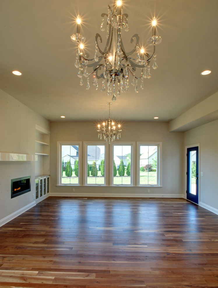 Photo of a contemporary games room in Cleveland with medium hardwood flooring.