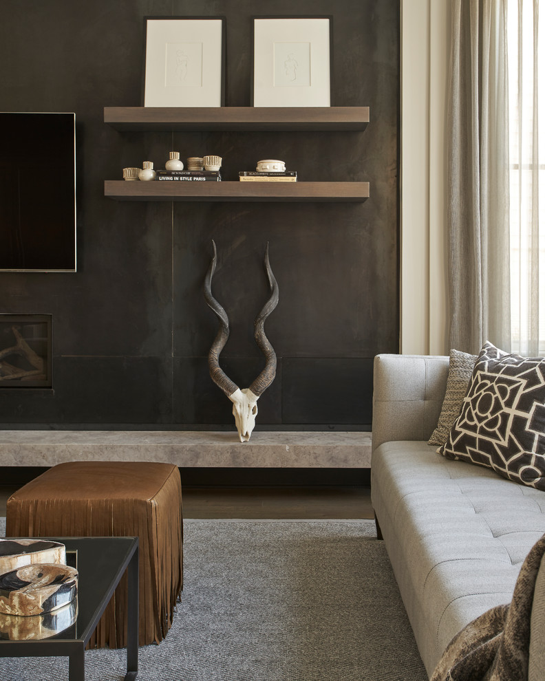 Photo of a large contemporary open plan games room in Chicago with a metal fireplace surround, a wall mounted tv, grey walls, dark hardwood flooring and a ribbon fireplace.
