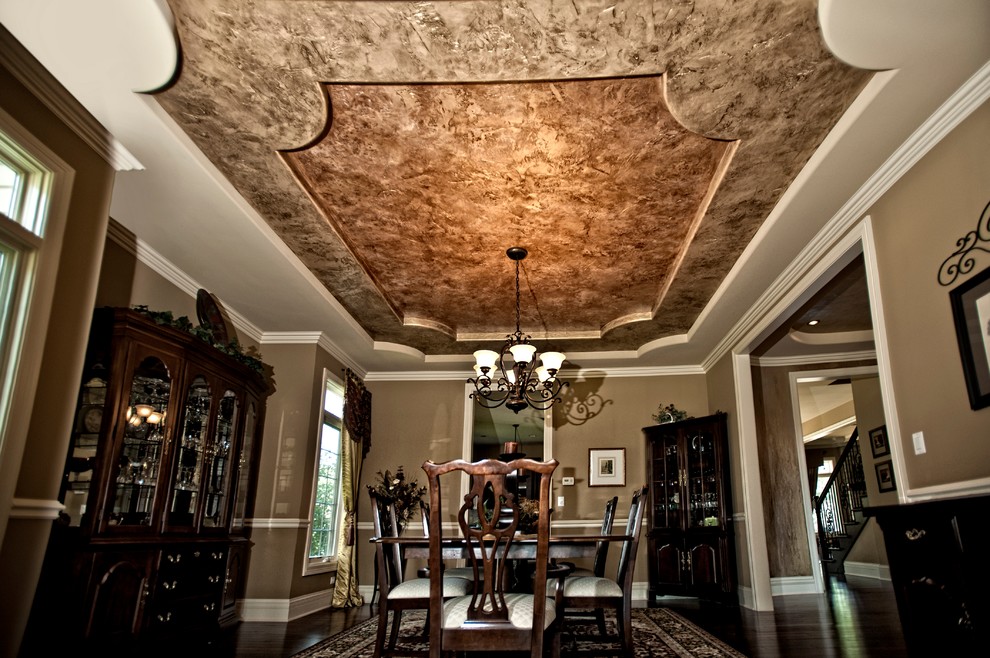 Example of a mid-sized classic dark wood floor family room design in Phoenix with beige walls