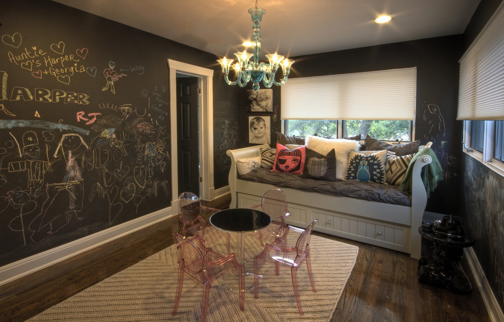 Family room - eclectic family room idea in Austin with black walls