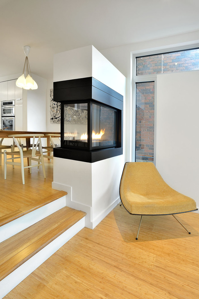 Inspiration for a contemporary living room in Toronto with white walls.