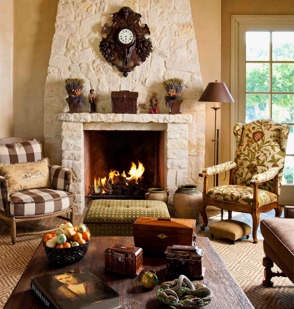Example of a mountain style open concept family room design in Dallas with a standard fireplace, a stone fireplace, beige walls and a media wall