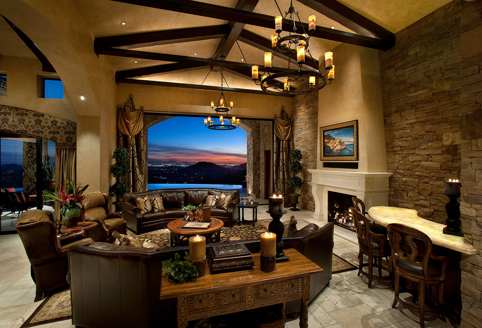 Example of a tuscan family room design in Phoenix