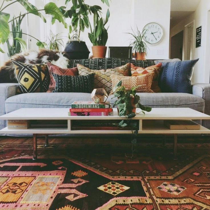 Inspiration for a mid-sized mid-century modern open concept medium tone wood floor and brown floor family room remodel in Other with white walls