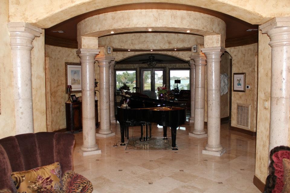Example of a tuscan family room design in Houston