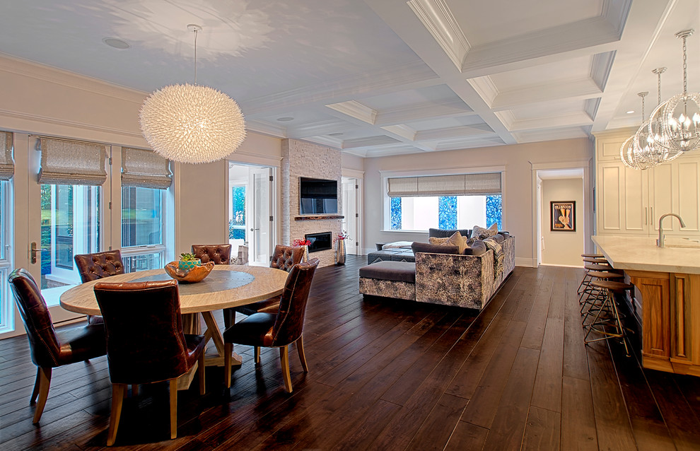 Family room - large transitional open concept dark wood floor, brown floor and coffered ceiling family room idea in Chicago with white walls, a standard fireplace, a stone fireplace and a wall-mounted tv