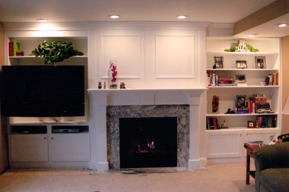 This is an example of a classic games room in Chicago with a standard fireplace.