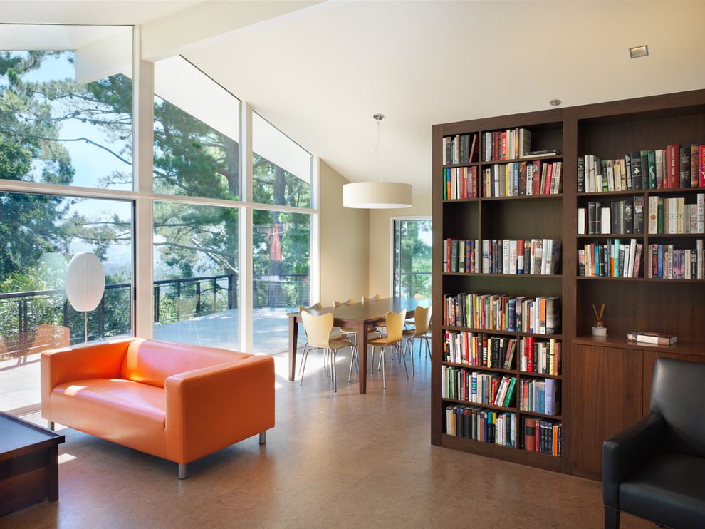 Ispirazione per un soggiorno design aperto con pareti beige