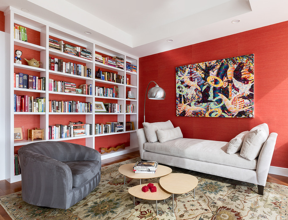 Inspiration för ett vintage allrum, med ett bibliotek och röda väggar