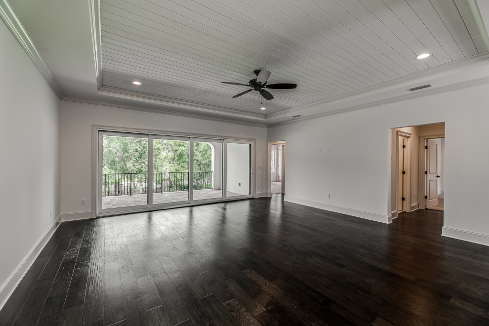 Large mediterranean enclosed games room in Jacksonville with a game room, white walls, medium hardwood flooring, no tv, brown floors and a wood ceiling.