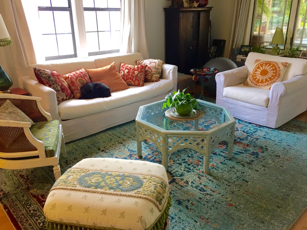 Inspiration for a mid-sized eclectic open concept turquoise floor family room remodel in Other with white walls and a wall-mounted tv