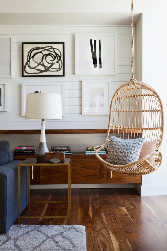 Example of a large 1950s open concept family room design in Los Angeles with a wall-mounted tv