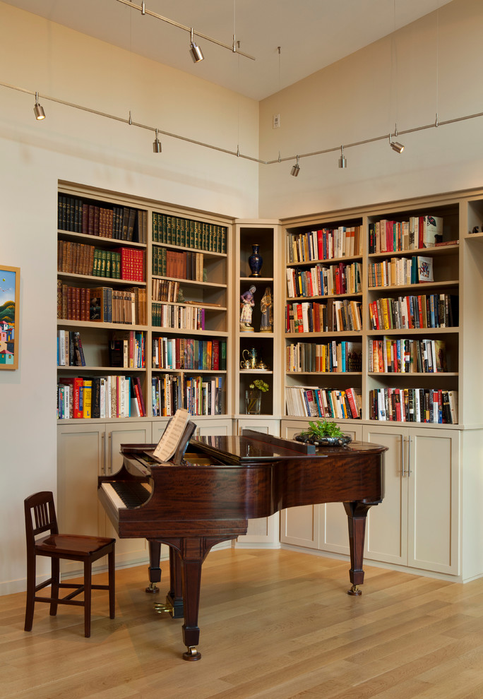 Eclectic family room library photo in San Francisco