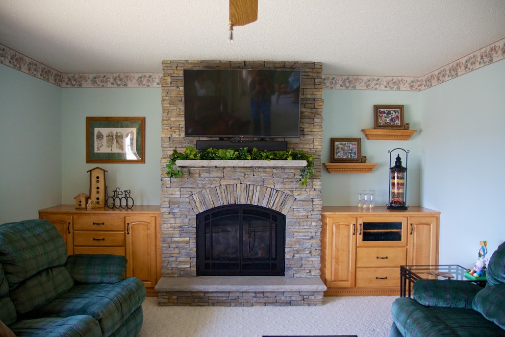 Example of a mid-sized family room design in Other with a standard fireplace and a stone fireplace