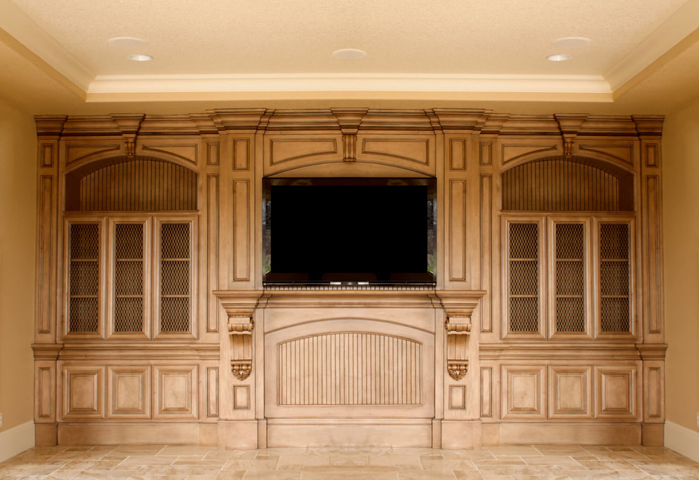 Example of a large ornate open concept travertine floor and beige floor family room design in Cleveland with beige walls, no fireplace and a concealed tv
