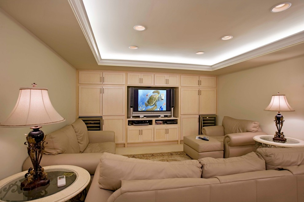 Family room - contemporary enclosed carpeted family room idea in Hawaii with beige walls and a media wall