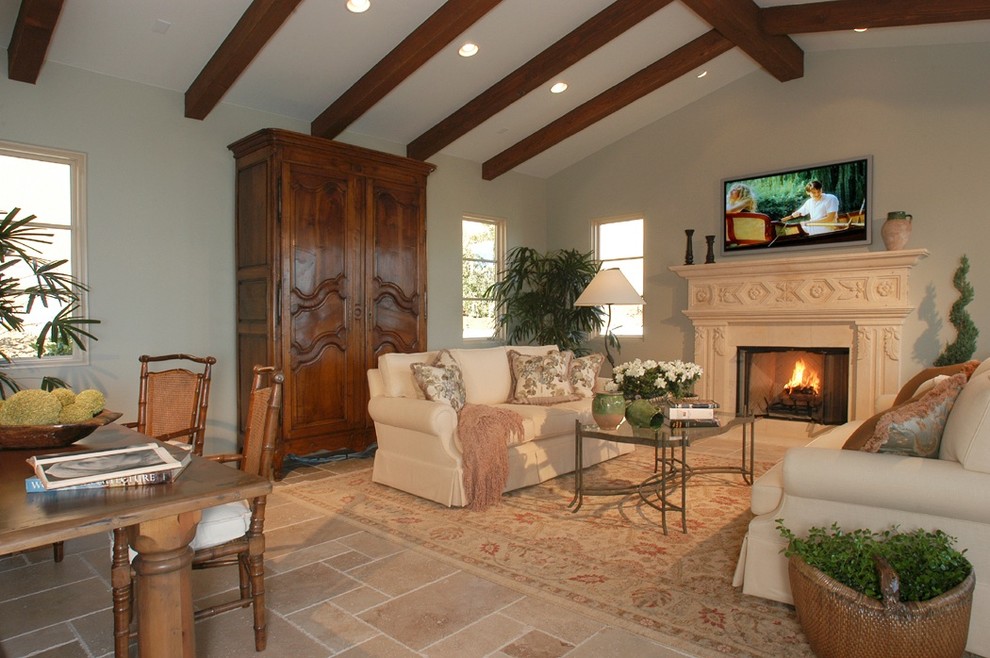 Tuscan family room photo in Los Angeles