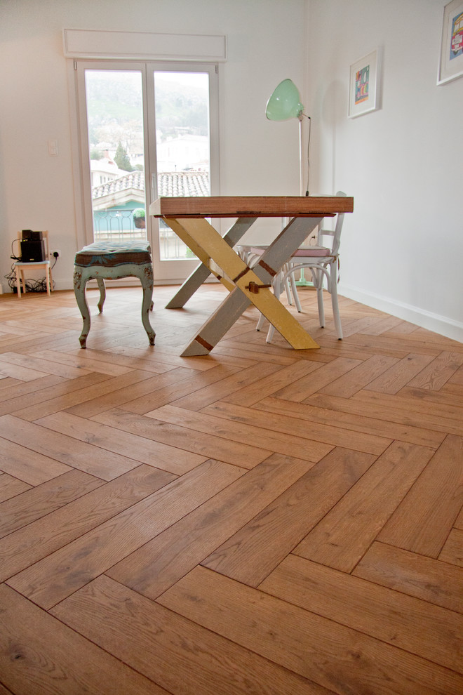 Example of a trendy medium tone wood floor family room design in Sydney