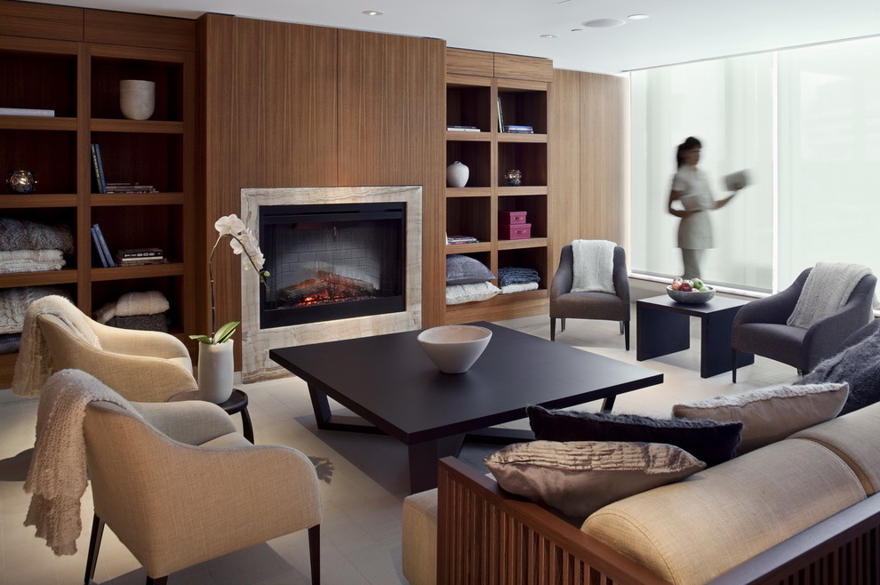 Inspiration pour une salle de séjour design de taille moyenne et ouverte avec une cheminée standard, un mur marron et un manteau de cheminée en carrelage.