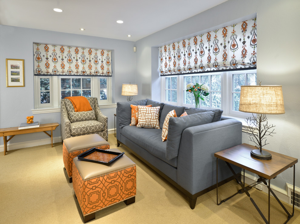 Immagine di un soggiorno design di medie dimensioni e aperto con pareti blu, moquette e pavimento beige