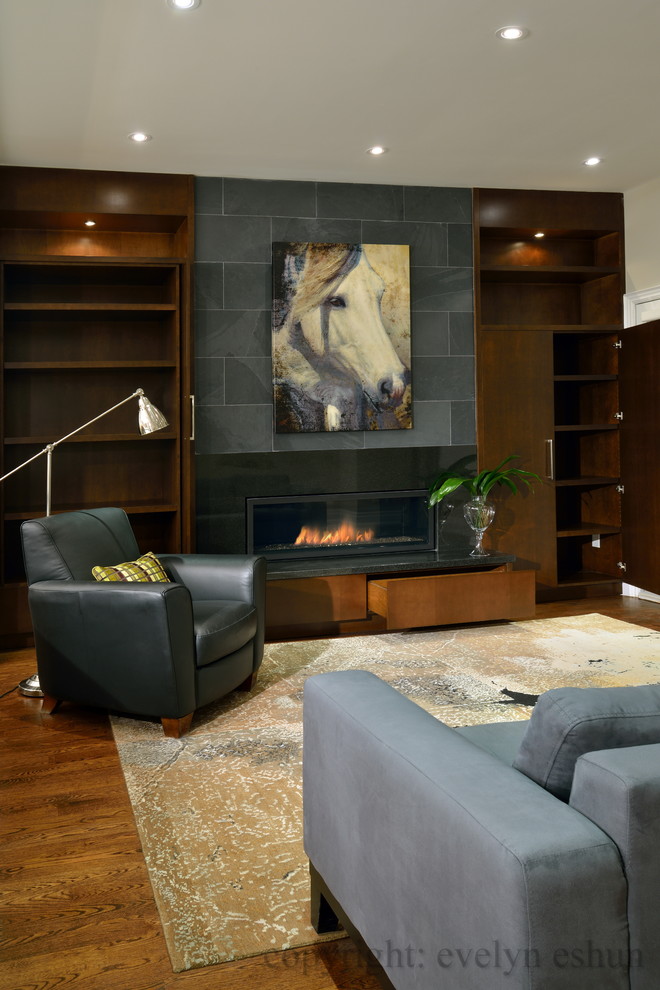 Example of a trendy family room design in Toronto
