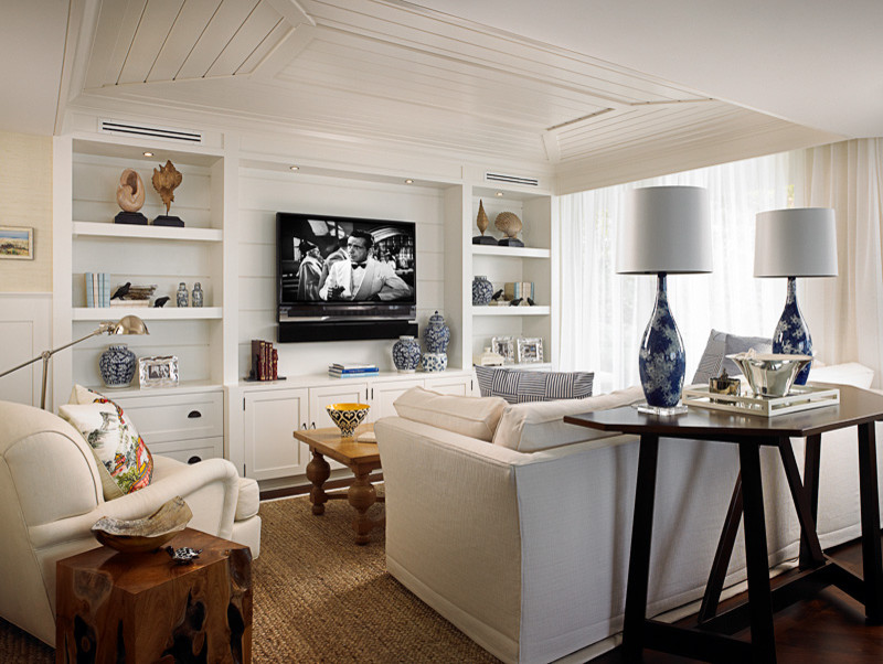 Example of a beach style family room design in Miami